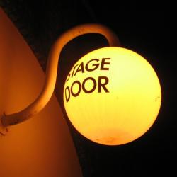 Old Vic stage door sign, photo taken by me (2007)